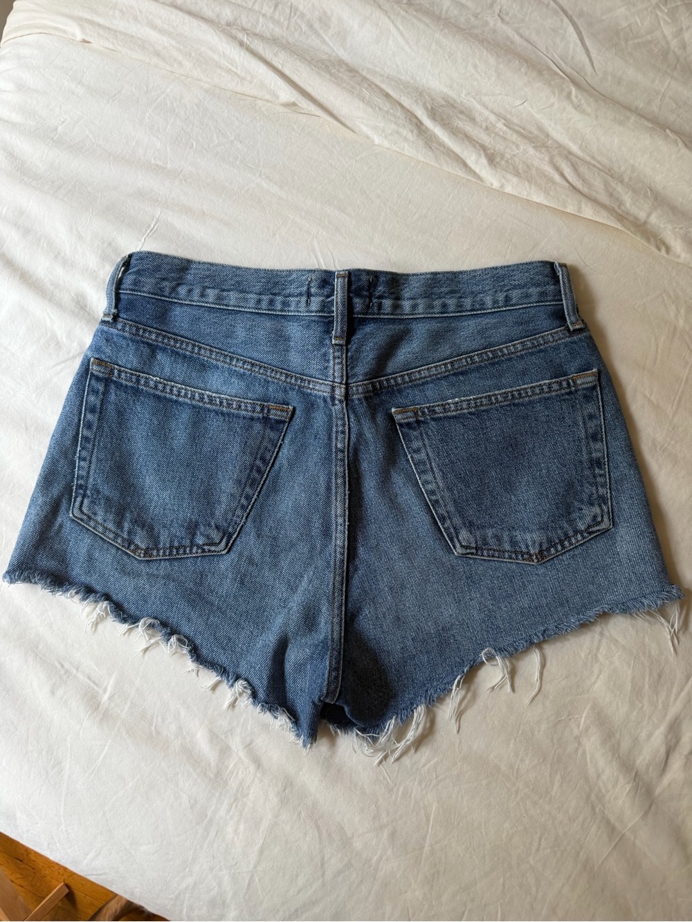 Agolde Medium Blue High-Rise Distressed Denim Cutoff Shorts - Picture 2 of 3